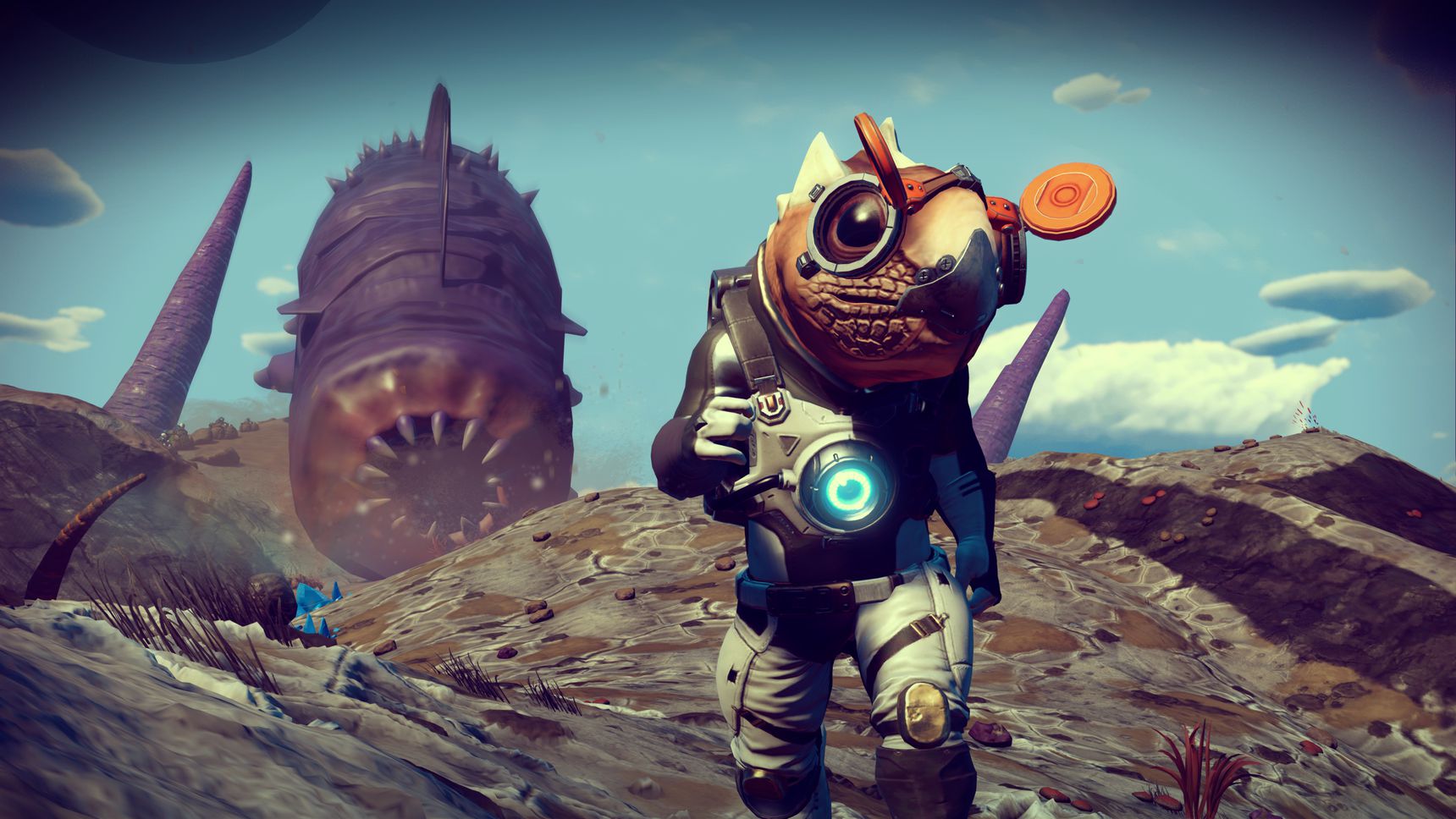 Um explorador espacial na superfície de planeta alienígena, sendo perseguido por uma minhoca gigante